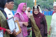 Berbaju Melayu Sultanah Latifah, Bupati Afni Sampaikan Pesan Kesetiaan di Upacara Hari Jadi Siak